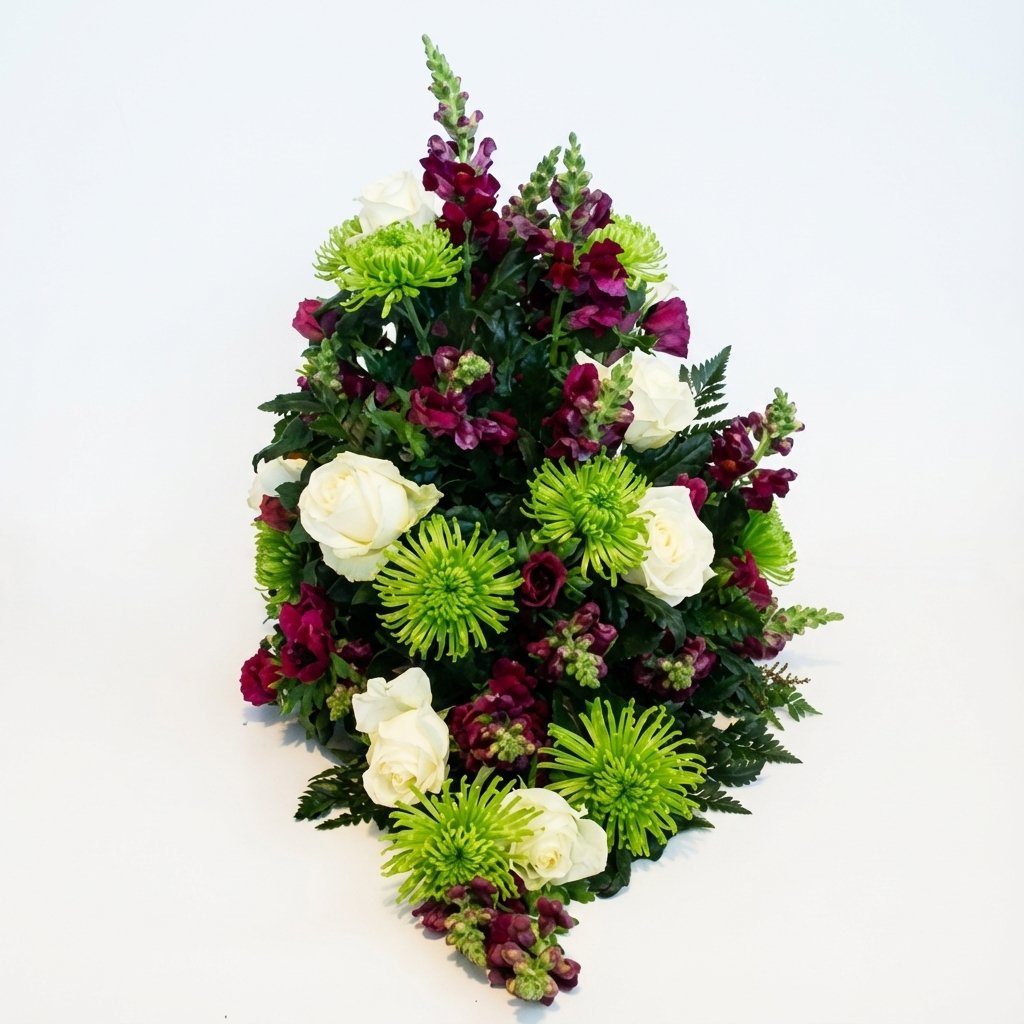 Båredekoration i grøn, hvide og lilla farver